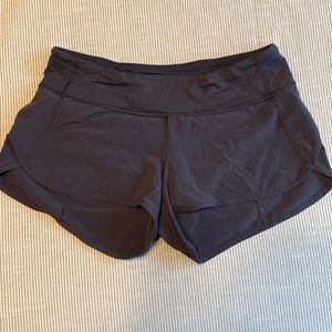 Lululemon - black speed-up shorts.